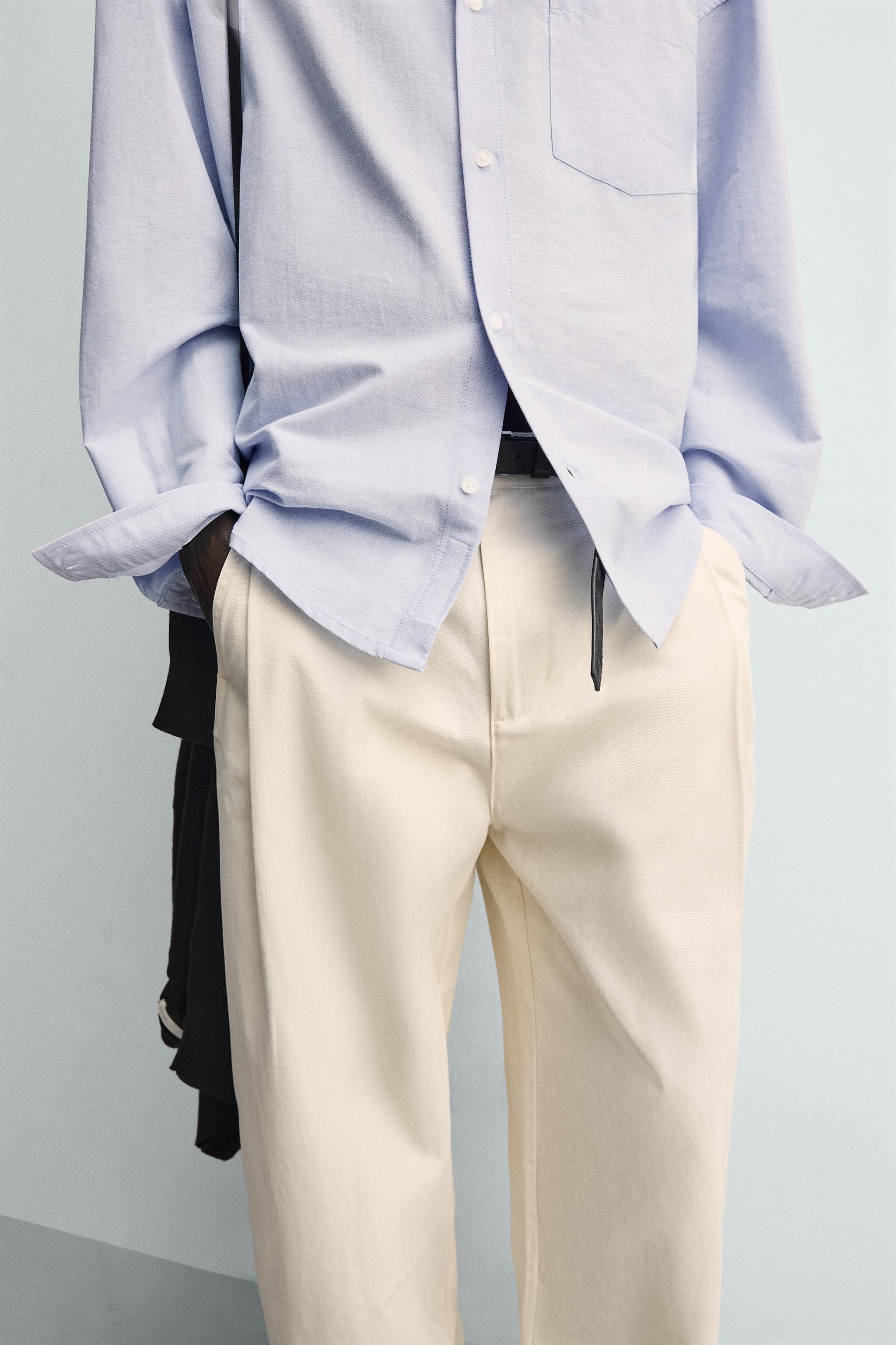 BALLOON FIT PLEATED PANTS